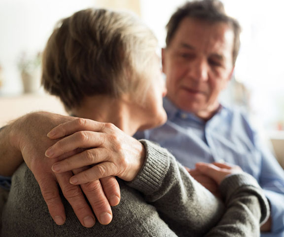 Older Couple Holding Hands