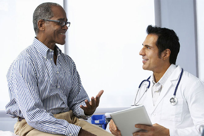 Healthcare Professional Speaking with a Patient
